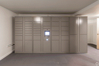 a large white closet with a door in a room